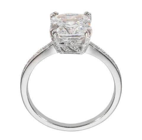 Vintage cushion engagement ring with delicate detail on sides