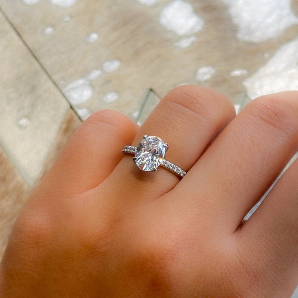 Cathedral oval engagement ring