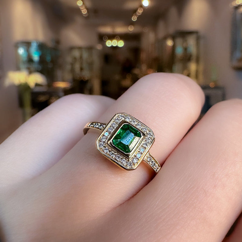 emerald halo engagement ring