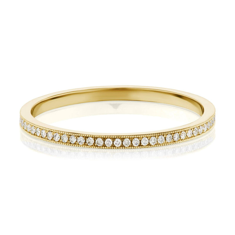 Pave diamond wedding ring in yellow gold