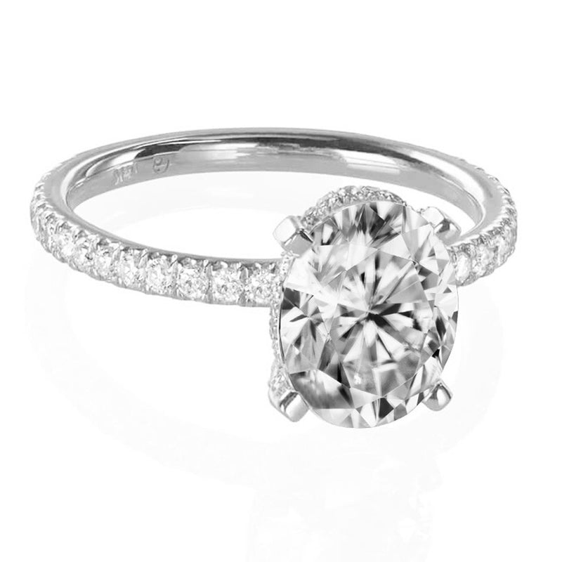 Oval diamond hidden halo engagement ring 