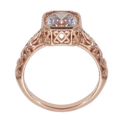 Rose gold antique engagement ring with detail on sides