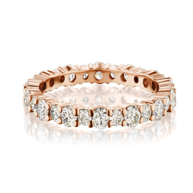 Shared prong diamond band in rose gold 