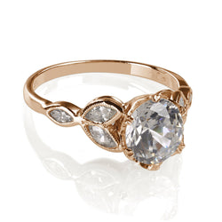 Rose Gold engagement ring with marquise diamonds 