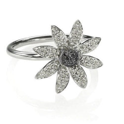 Edgy diamond flower ring